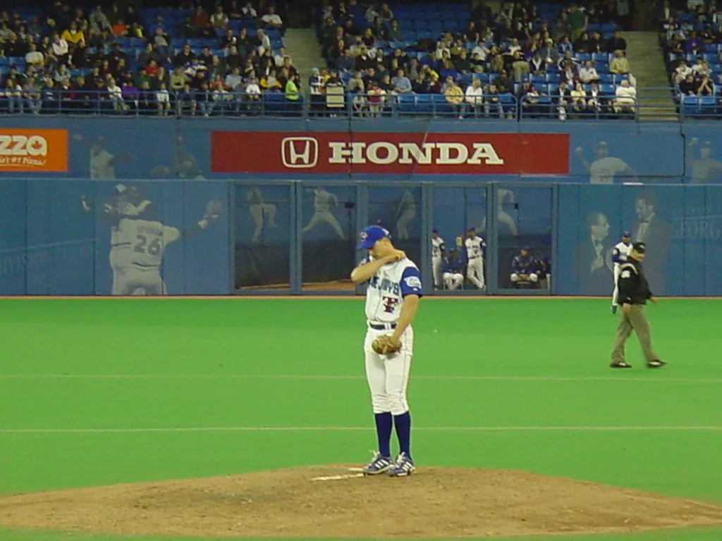 Bob File preparing on the mound inside the Toronto Blue Jays stadium.